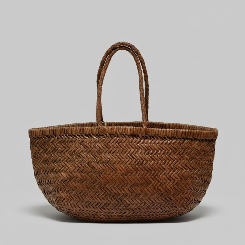 Woven basket with a decorative tag on a beige background